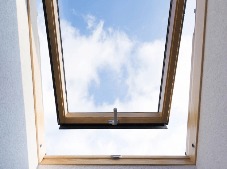 Residential skylight bringing natural light into a living room